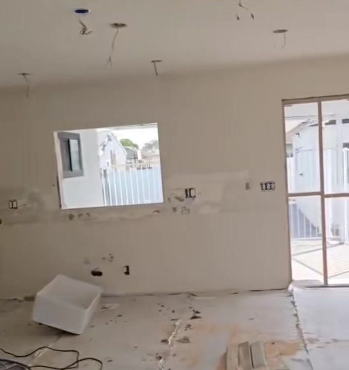 During the remodel: gutted kitchen wall in the Norwalk home before new cabinets